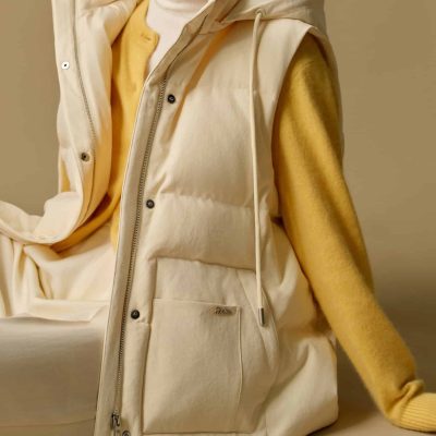 Soft cream-colored jacket with a hood, layered over a yellow sweater, showcasing stylish outerwear options from Monalisa Store for fashionable and comfortable casual wear.