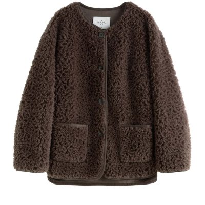 Cozy brown fleece or teddy bear-style jacket, perfect for cold weather, featuring front pockets, button closure, and warm plush fabric, suitable for men's or women's fashion.