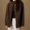 Brown fluffy wool coat for women at Monalisa Store, stylish and cozy winter outerwear, perfect for cold weather, fashion-forward and comfortable, ideal for winter fashion enthusiasts.