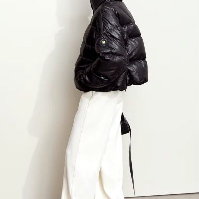 Down-filled black puffer jacket with Monalisa logo patch, paired with wide-leg white trousers and sneakers, showcasing stylish winter fashion from Monalisa Store.