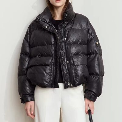 Down-filled black puffer jacket with a logo patch, stylish and warm, perfect for winter fashion from Monalisa Store.