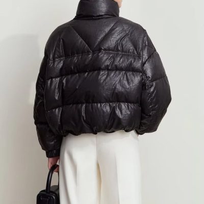 Stylish black puffer jacket with high collar, perfect for cold weather, showcased at Monalisa Store for trendy winter fashion.