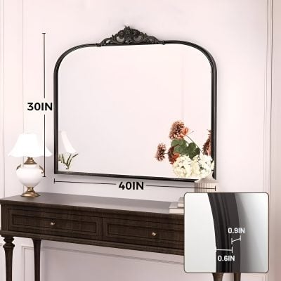 Elegant black framed wall mirror with ornate top design, dimensions 40x30 inches, ideal for bedroom or entryway decor. Perfect for enhancing space and adding style to your home.
