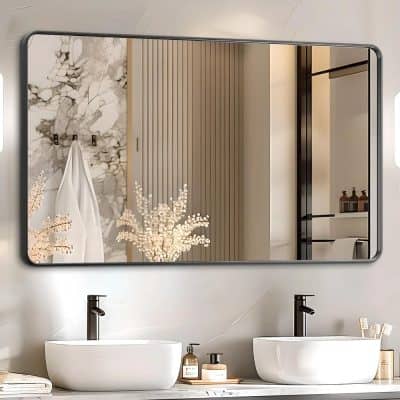 Elegant modern bathroom with dual white vessel sinks, sleek black faucets, and stylish decor featuring flowers and skincare products from Monalisa Store.