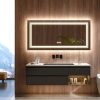 Modern bathroom vanity with sleek black cabinetry, illuminated rectangular mirror, and minimalist decor, perfect for a contemporary optometry or ophthalmology clinic setting.