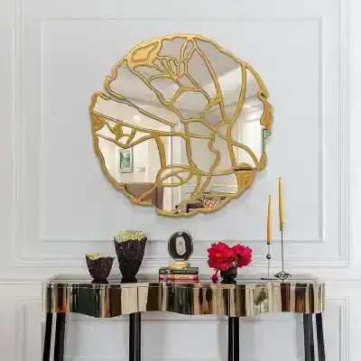 Contemporary gold wall mirror with abstract geometric design reflecting elegant interior decor. Ideal for modern living spaces, enhances aesthetic appeal with unique art piece.