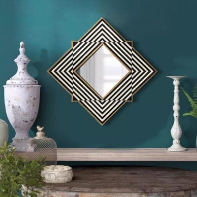 Elegant geometric mirror with black and gold accents for modern interior decor at Monalisa Store.