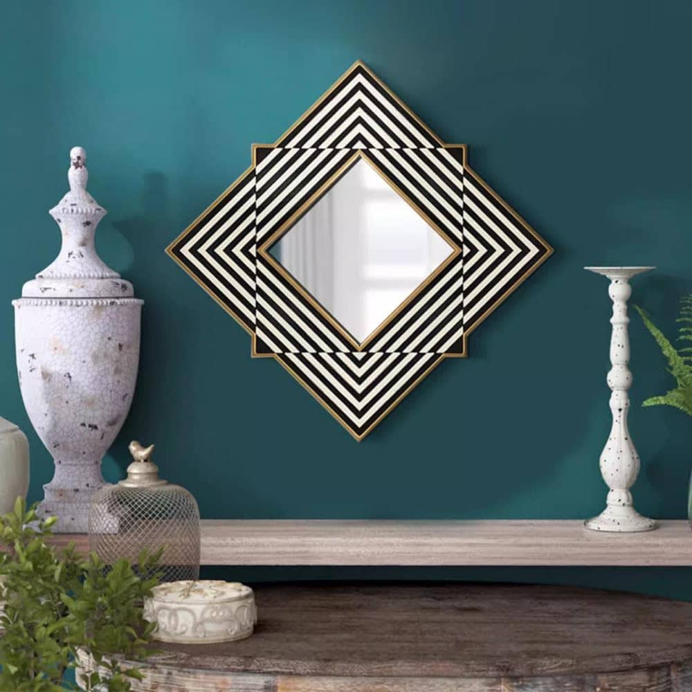 Elegant geometric mirror with black and gold accents for modern interior decor at Monalisa Store.