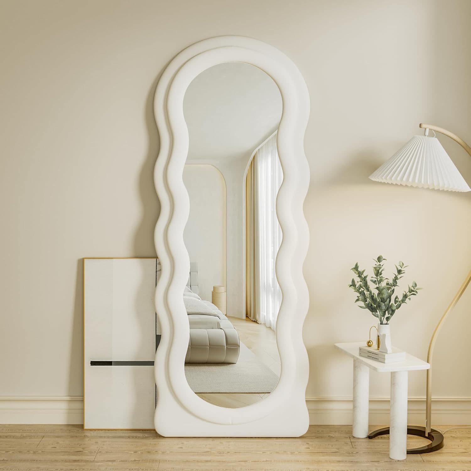 Wavy-edge white framed full-length mirror in a stylish, modern bedroom with neutral tones and minimalist decor, ideal for home or professional optometry clinic settings.