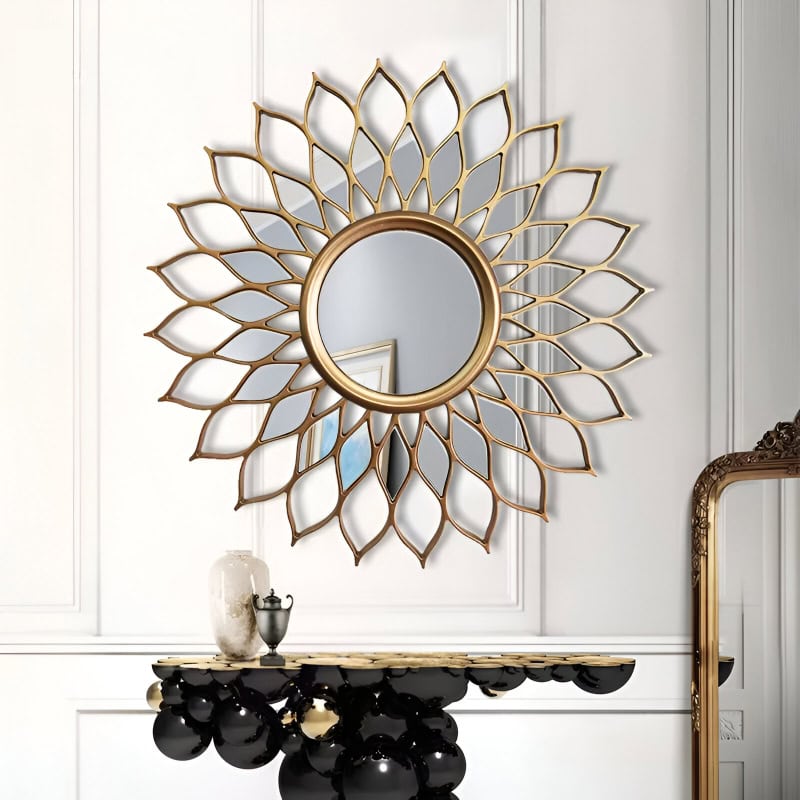 Decorative gold sunburst wall mirror with intricate petal design, perfect for enhancing interior aesthetics and adding elegance to living spaces. Ideal for modern and classic decor styles.