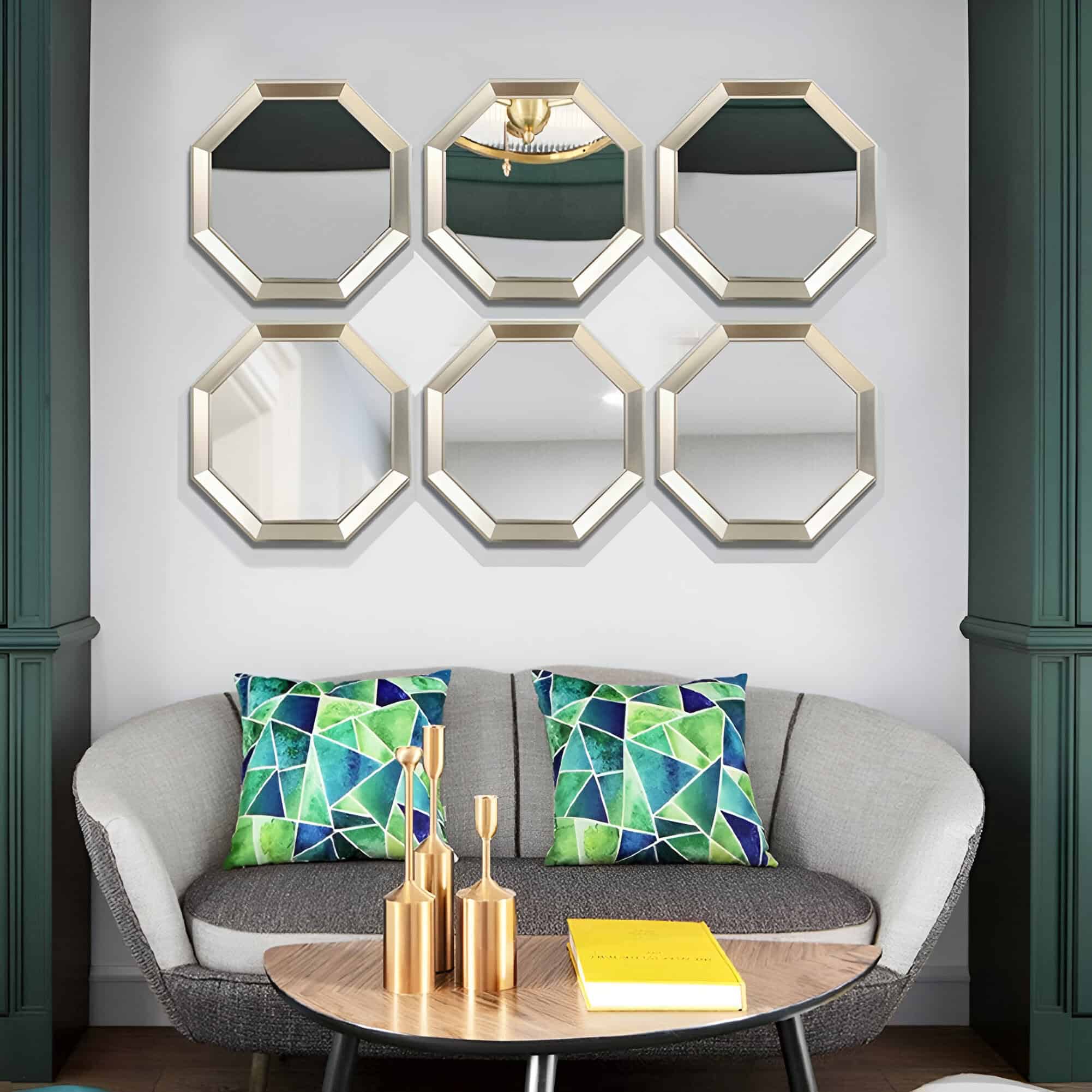 Reflections of chandelier in gold octagon mirrors, modern living room interior, stylish wall decor, cozy seating with colorful pillows, contemporary home design, Monalisa Medical store inspiration.