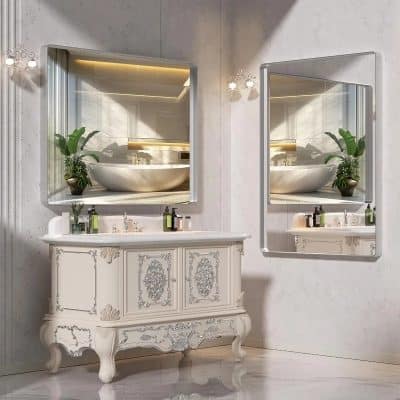 Luxury bathroom vanity with large mirror, decorative classical style, elegant white furniture, modern bathroom design, and greenery for spa-like ambiance.
