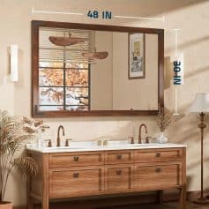 Exterior view of a modern bathroom vanity with a large mirror, wooden cabinet, and copper fixtures in a cozy home setting.