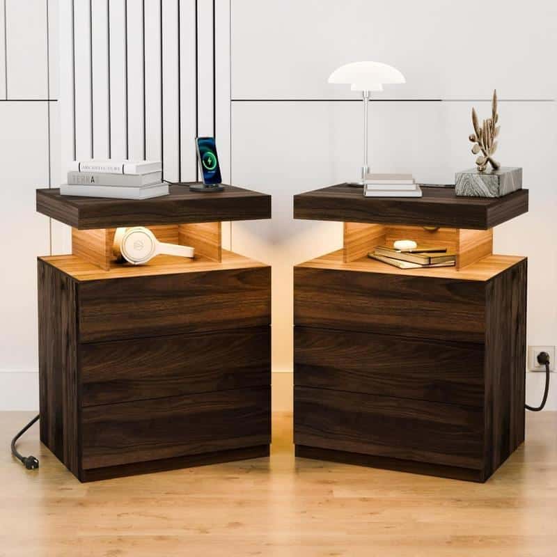 Dark wood bedside tables with modern tops featuring decorative accessories and books, creating a stylish, cozy space perfect for an optometry office or medical clinic waiting area.
