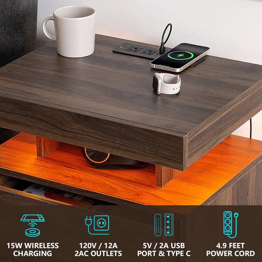 Wireless charging station on a wooden desk with electronic devices and power outlets, ideal for modern office or home use.