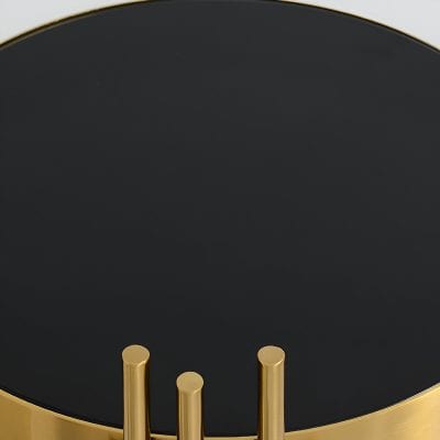 Sleek black and gold optical display stand showcasing premium eyeglasses and lenses at Monalisa Store for quality eye care and fashionable eyewear shopping.