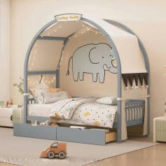 Colorful elephant-themed kids bed with canopy and fairy lights, perfect for children's bedroom decor. Elegant and fun design suitable for boys and girls, blending comfort and playful style.