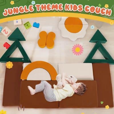 Colorful jungle theme kids play area with foam trees, flowers, and animal shapes, designed for children’s fun and learning in a vibrant setting.