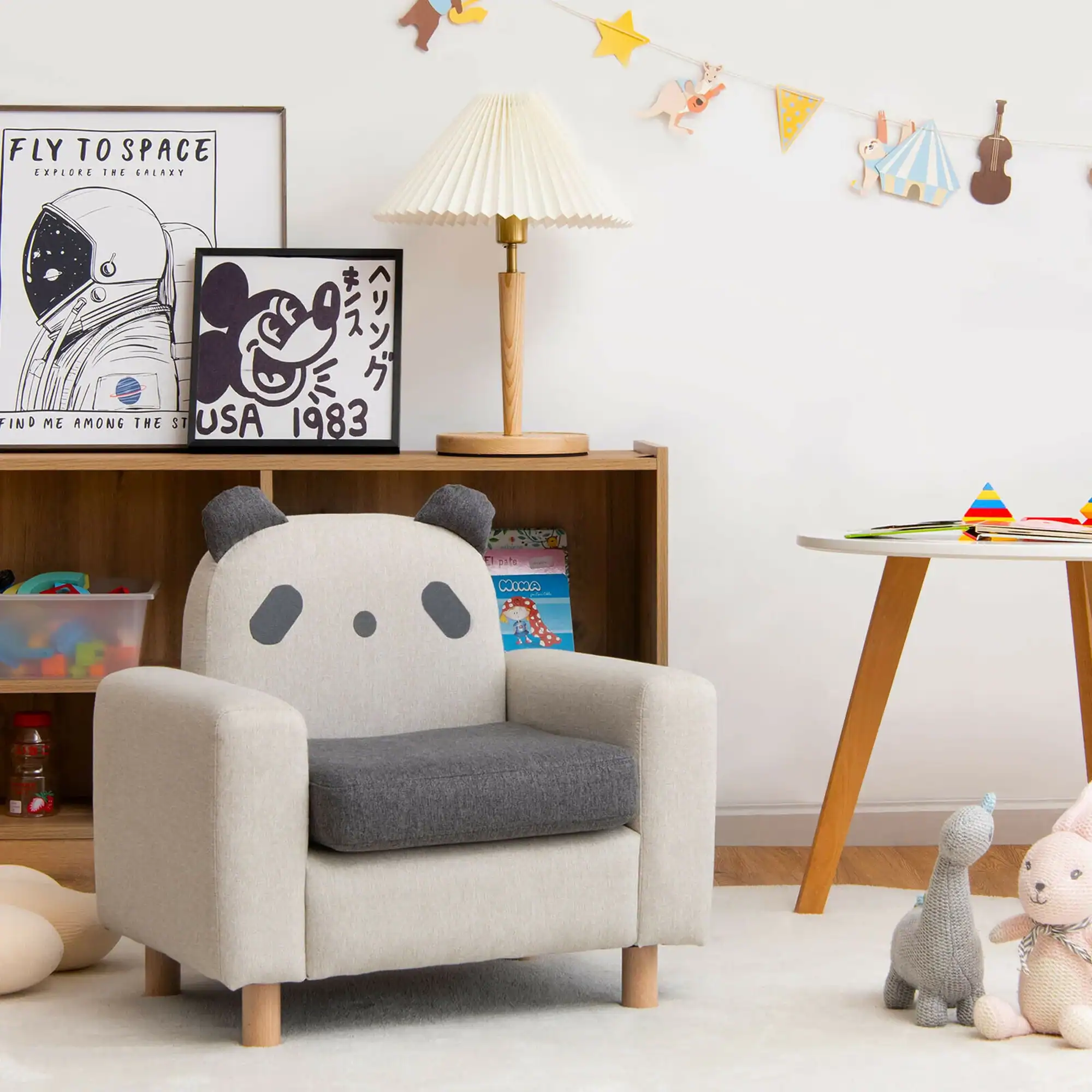 Cute panda-themed children's armchair with soft upholstery in a playful, colorful nursery setting. Perfect for kids' rooms, blending comfort and fun with adorable animal design.
