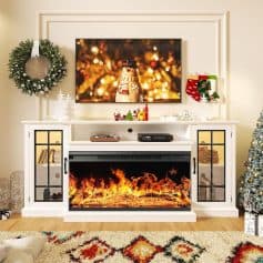 Festive holiday living room decor featuring a fireplace with a vibrant fire insert, Christmas stockings, a decorated Christmas tree, and a mounted TV display for cozy seasonal ambiance.