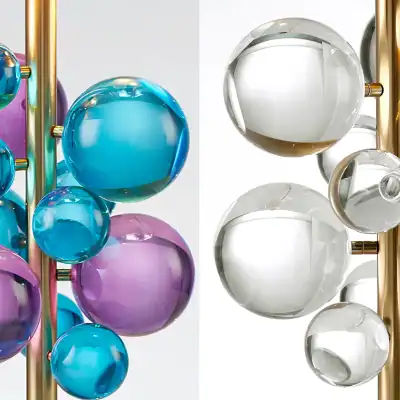 Blue and purple glass spheres on a gold-colored structure, decorative art piece.
