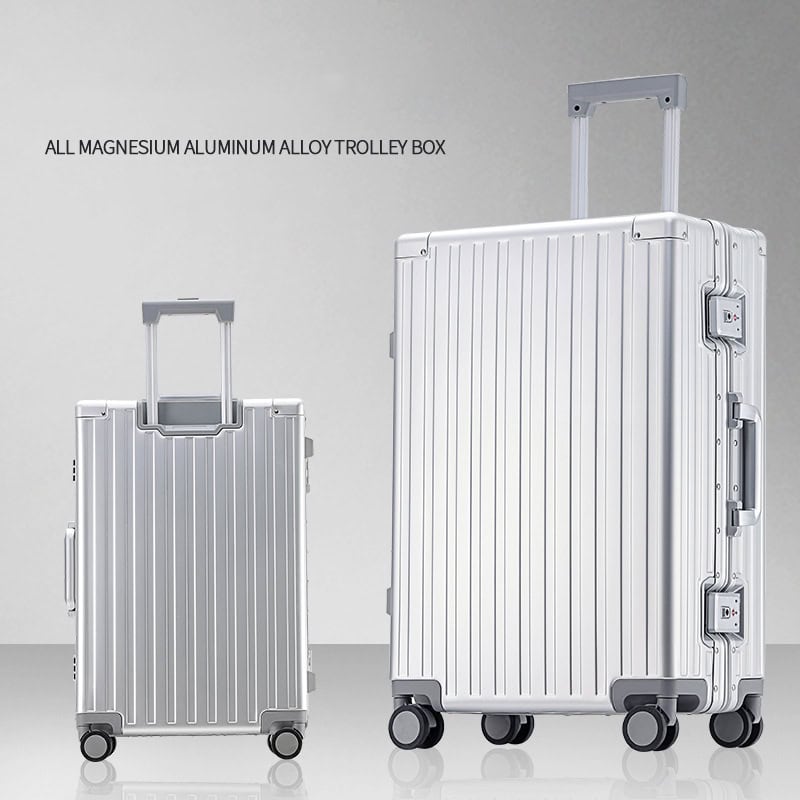 Aluminum magnesium trolley suitcase with extendable handle and four wheels for easy travel, durable and lightweight travel luggage for business or leisure trips.