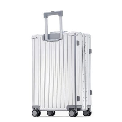 Aluminum travel suitcase with telescopic handle and 360-degree wheels, durable and lightweight for easy mobility.