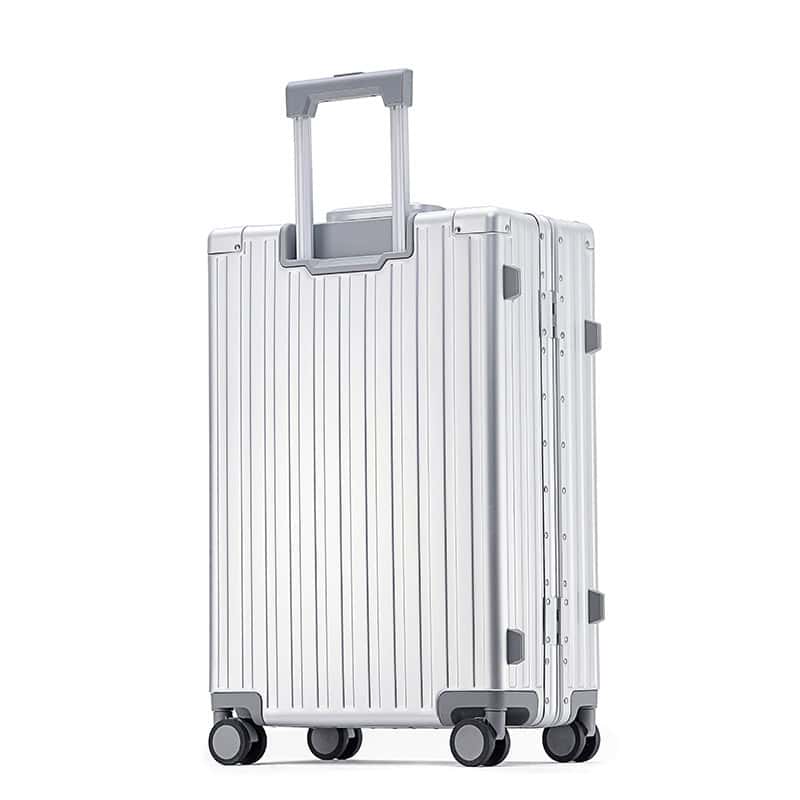 Aluminum travel suitcase with telescopic handle and 360-degree wheels, durable and lightweight for easy mobility.
