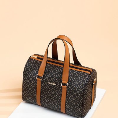 Elegant designer travel bag with monogram pattern, perfect for stylish trips and daily use, featuring durable leather straps and multiple compartments.