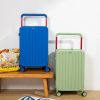 Bright blue and light green hard-shell travel suitcases with durable wheels, perfect for stylish travel and luggage storage. Ideal for travelers seeking colorful, lightweight, and versatile luggage options.