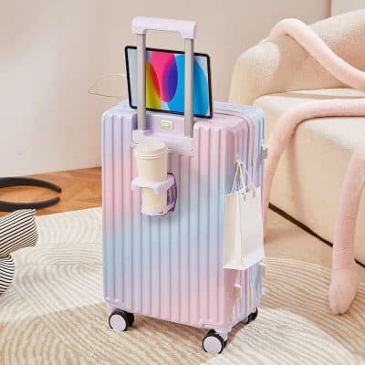 Travel suitcase with integrated tablet holder, coffee cup, and shopping bag for convenient travel essentials at Monalisa Medical Store.