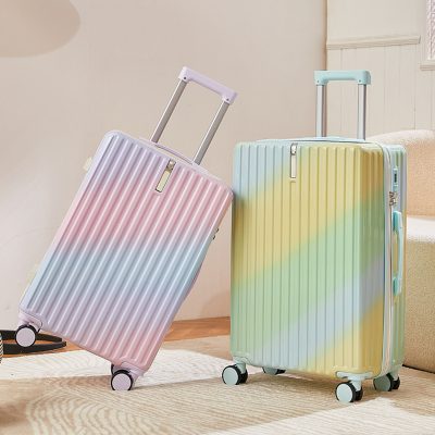 Pink and green colorful suitcases with retractable handles and 4 wheels, stylish travel luggage for women and men, Monalisa Medical store travel accessories, durable and lightweight hardside luggage for trips and vacations.