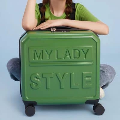 MY LADY STYLE green suitcase with embossed text, trendy travel luggage for fashion-conscious women. Perfect for stylish trips and airport travel, combining functionality and chic design.
