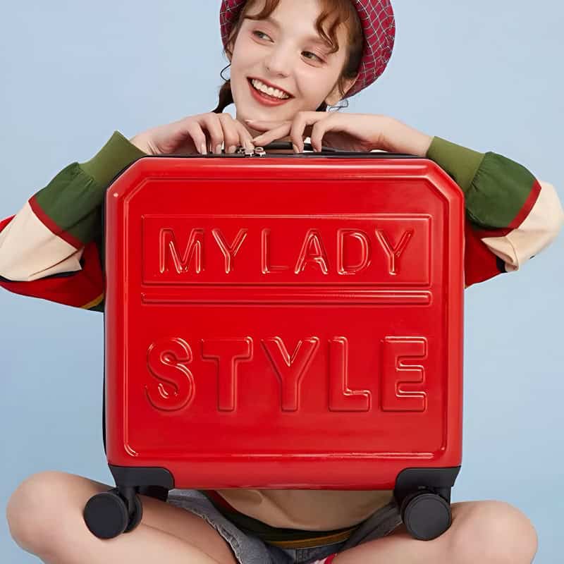 Stylish woman with red suitcase featuring "MY LADY STYLE" text, casual fashion, travel and luggage, smiling traveler, vibrant accessories, fashion accessories, modern travel gear, cheerful mood, trendy luggage, young traveler, fashion-forward travel, Monalisa Medical store keyword relevance.