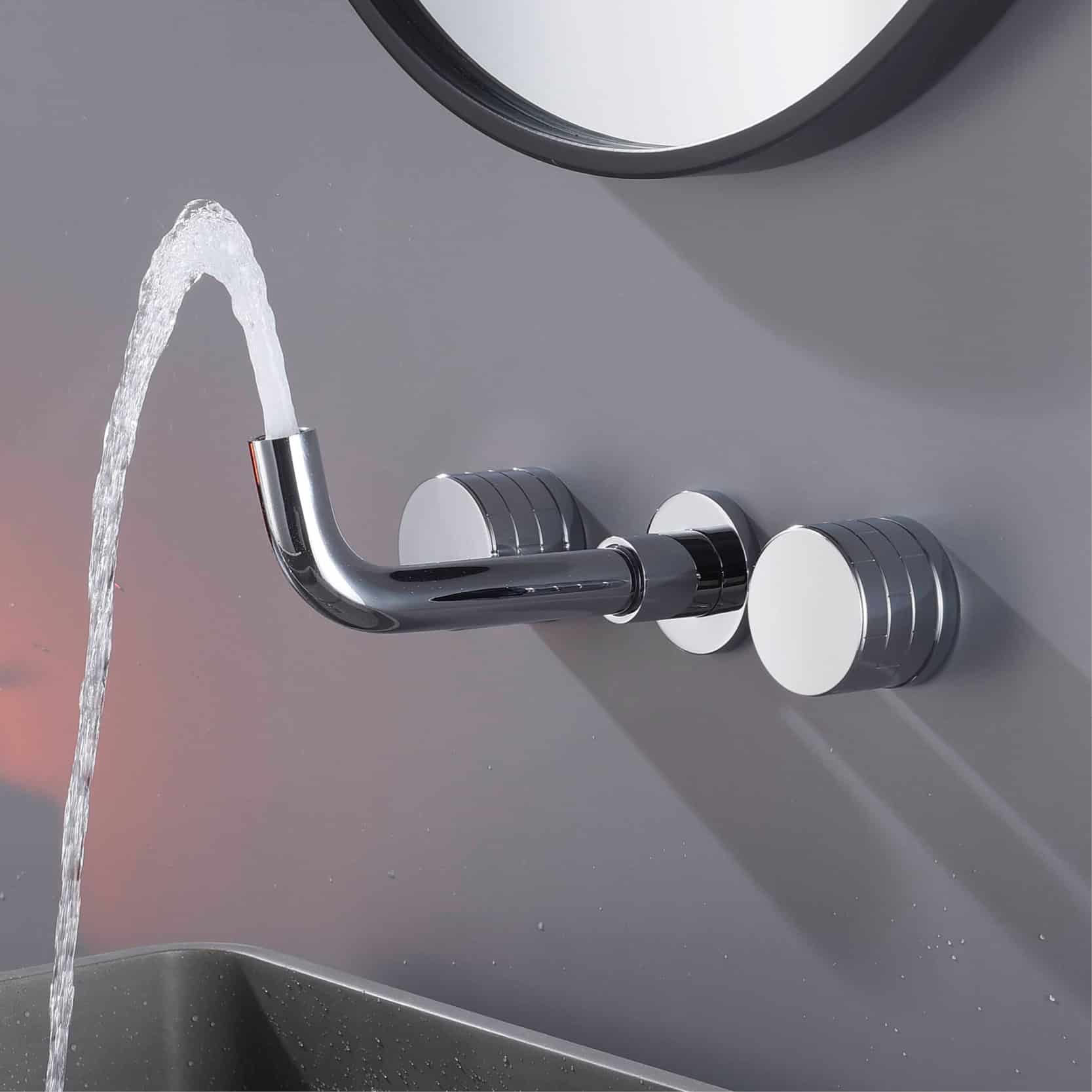 Faucet with running water on a modern gray sink, close-up shot.