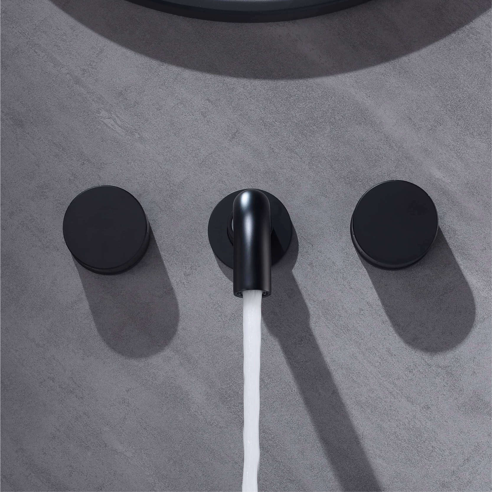 Sleek black faucet with water flowing, modern bathroom fixture for a stylish and functional look. Perfect for enhancing your bathroom decor and providing easy access to water.