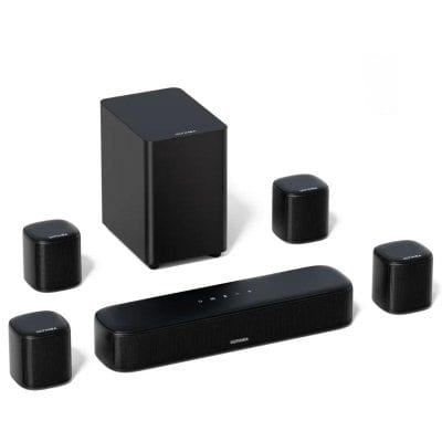 Wireless home theater speaker system with subwoofer and surround speakers for high-quality audio experience.