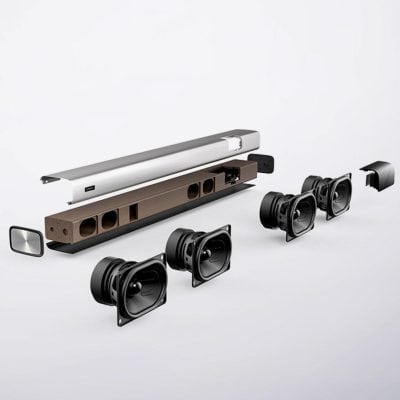 High-quality home theater speaker system components including woofers, tweeters, and soundbar, perfect for enhancing your entertainment experience with premium audio solutions.