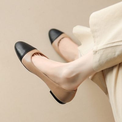Leather ballet flats with black toe caps, beige body, stylish and comfortable footwear from Monalisa Store. Perfect for casual or office wear, combining elegance with everyday practicality.