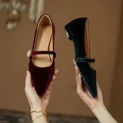 Elegant women's black and burgundy velvet shoes with a decorative brooch and comfortable heels, ideal for fashionable occasions. Perfect for enhancing your style with high-quality footwear from Monalisa Medical.