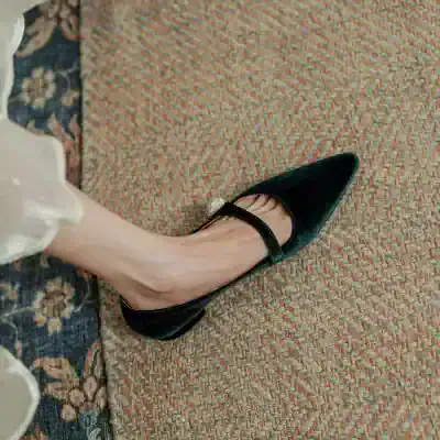 Luxury black pointed toe high heel shoe with ankle strap, elegant footwear for women, captured from Monalisa Store.