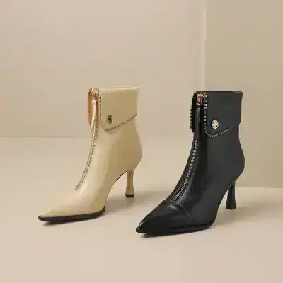 Beige and black high-heel ankle boots with zipper detail from Monalisa Store, perfect for stylish footwear enthusiasts.