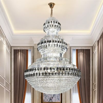 Elegant crystal chandelier in luxury interior with high ceilings, stylish drapes, and modern decor, perfect for upscale spaces, beauty salons, and optometry clinics like Monalisa Store.