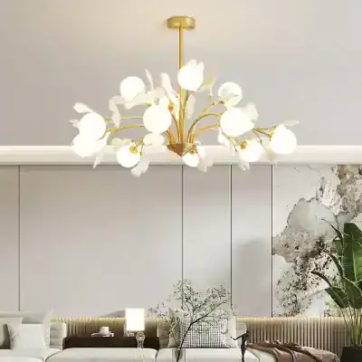 Elegant modern chandelier with floral-inspired design in a contemporary living room, featuring sleek white and gold accents. Perfect for enhancing upscale interior decor.