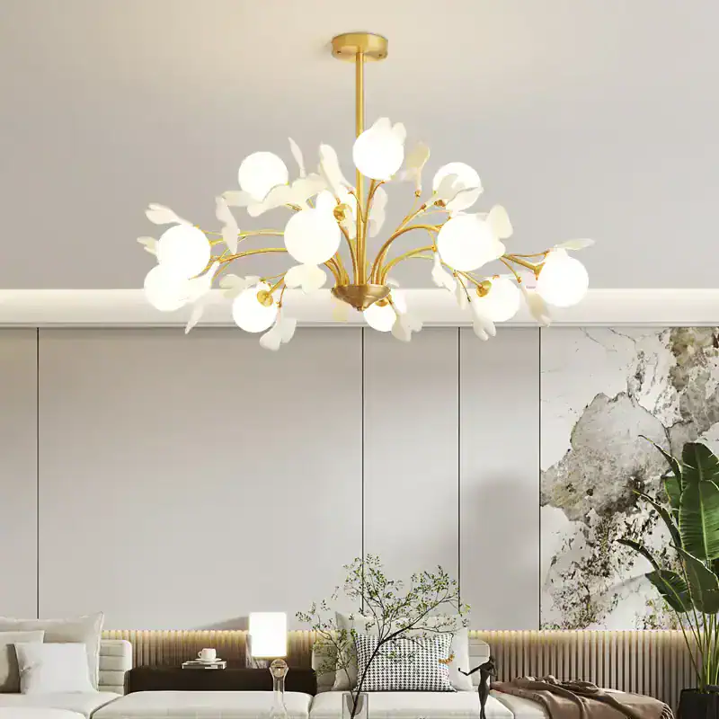 Elegant modern chandelier with floral-inspired design in a contemporary living room, featuring sleek white and gold accents. Perfect for enhancing upscale interior decor.