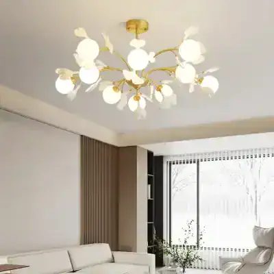 Elegant modern chandelier with white glass flower-shaped shades and gold accents, perfect for stylish home lighting.
