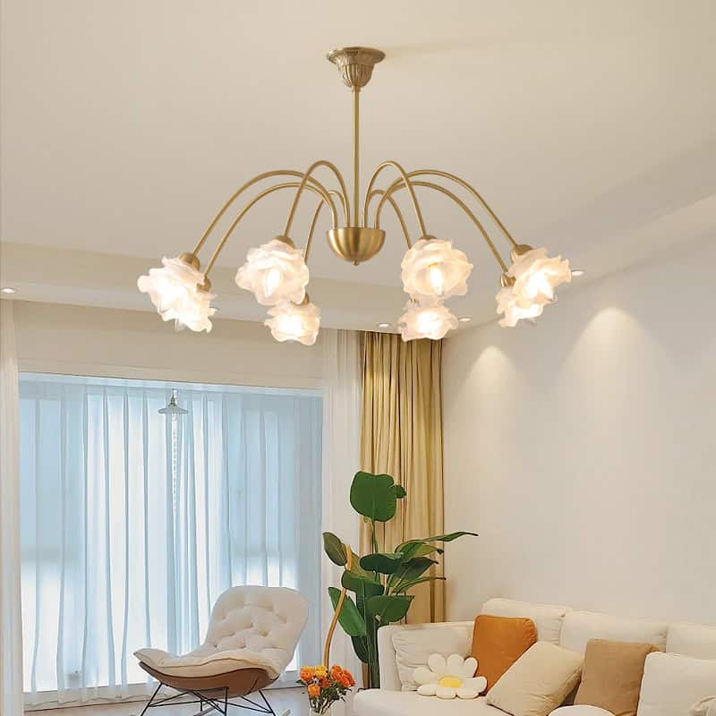 Elegant chandelier with floral glass shades in a modern living room designed for comfort and style, featuring neutral tones, cozy seating, and stylish decor elements.