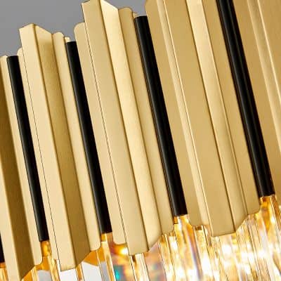 Bookshelf with gold and black books, elegant decor.