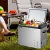 Stainless steel portable mini fridge with freezer compartment, ideal for storing beverages, snacks, and groceries outdoors or at events. Perfect for modern kitchens, offices, and camping trips.