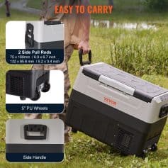 2. Portable cooler with wheels, side handle, and pull rods suitable for outdoor use and travel.